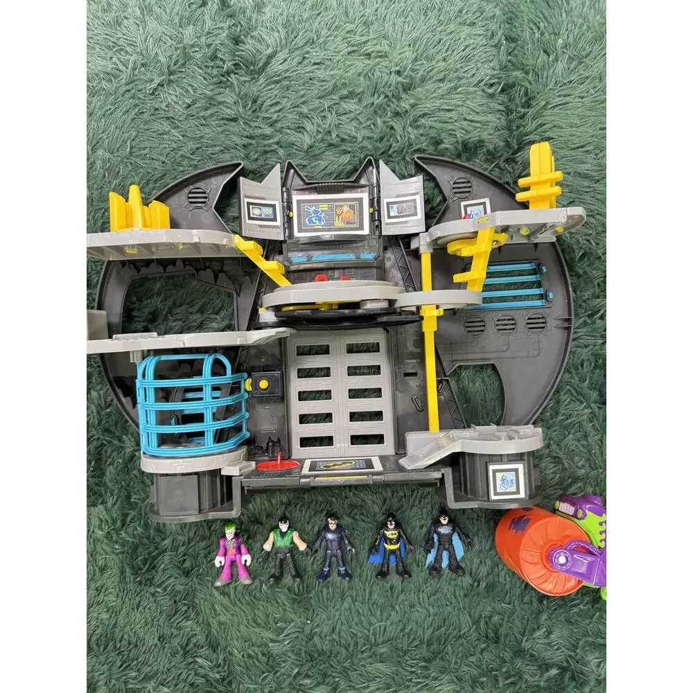 Fisher-Price Imaginext DC Super Friends Batcave Playset with 5 Figures & Vehicle